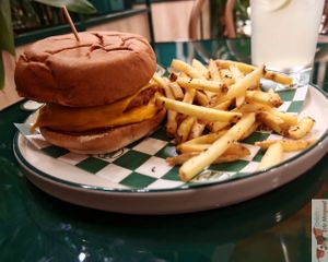 Double BBQ Burger, crushed double patty, veggie cheddar, bacon, onion ring, mayonnaise and bbq sauce in a potato bun, very good and hearty. at Neat Burger - Porta Venezia in Milan