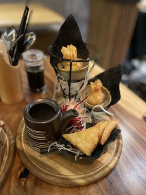 Money bag and triangle   at Mandala Vegan Köln in Cologne