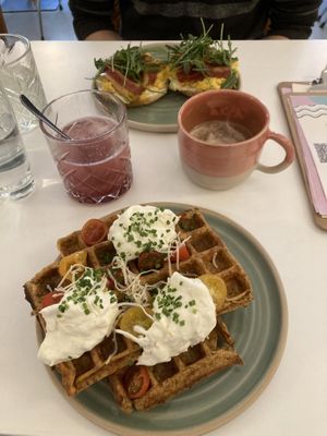 Alex waffle (savoury with sour cream and radish) and breakfast bagel (avocado, vegan egg, vegan bacon), hot cocoa, strawberry lavender lemonade   at Bistro Deppat in Vienna