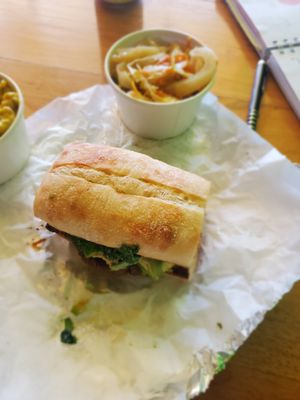 Yummy burger and cabbage. at Kale Cafe Vegan Kitchen in Daytona Beach