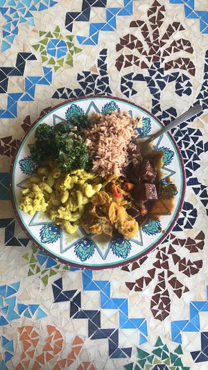 value plate with kale salad, Mac, seitan, tofu, and rice at Kale Cafe Vegan Kitchen in Daytona Beach