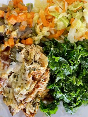 Lasagna, kale salad, Cole slaw and black eyed peas    at Kale Cafe Vegan Kitchen in Daytona Beach