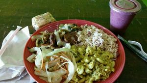 Delicious #vegan lunch at kale cafe. #seitan brown stew with rice and beans, mac n cheez and veggies. A piece of carrot cake and a fruit smoothie. at Kale Cafe Vegan Kitchen in Daytona Beach