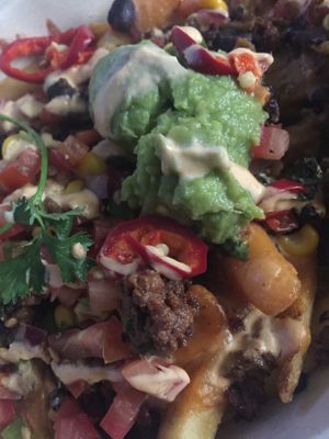 Southwestern Nachos with fries instead of chips. Highly recommend. at Veggie Grill by Next Level in Westlake Village