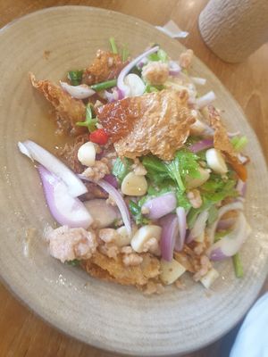 Fried vegan egg spicy salad - 7/10 it's nice but hard to eat cuz of just sm raw onion garlic and chilli which I'm not an expert at devouring, if this was a small starters 👍 at Kem-Kon KhaoSan (เข้ม-ข้น ข้าวสาร) in Bangkok