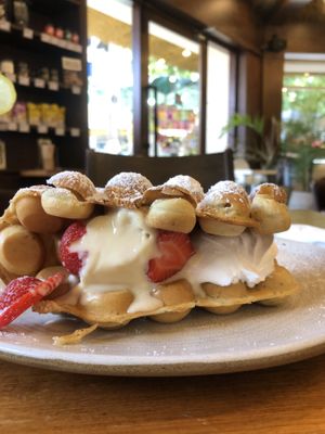 waffle with ice cream, whipped cream, strawberry   at Kem-Kon KhaoSan (เข้ม-ข้น ข้าวสาร) in Bangkok