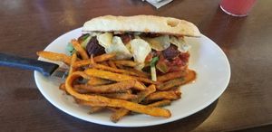Meatball sandwich with sweet potato fries at Native Foods in Glendale
