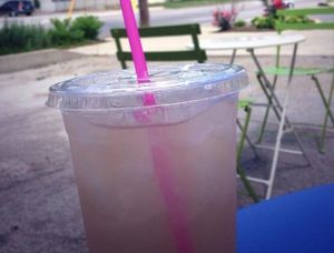 Lavender lemonade in the outdoor seating area at Rainbow Bakery in Bloomington