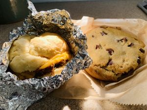 Breakfast sandwich + chocolate chip cookie!  at Rainbow Bakery in Bloomington