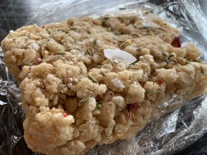 Rice Krispie- new and improved! Lovely spices on top. Incredible!!! 🤤   at Rainbow Bakery in Bloomington