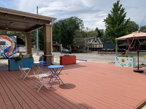 Charming outdoor seating right on Rogers / 4th Street!! 🌈  at Rainbow Bakery in Bloomington