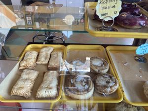 Cinnamon roll an apple pie  at Rainbow Bakery in Bloomington