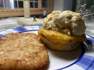 Breakfast sandwich + hash brown at Rainbow Bakery in Bloomington