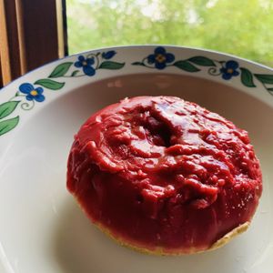 Raspberry orange donut! at Rainbow Bakery in Bloomington