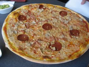 'Gullefjun' with chi chi ('chicken'), pepperoni, 'ham', pine seeds and guacamole at Pizzeria Fellini in Stockholm