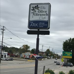 Store sign at The Olive Branch Cafe in Lewiston