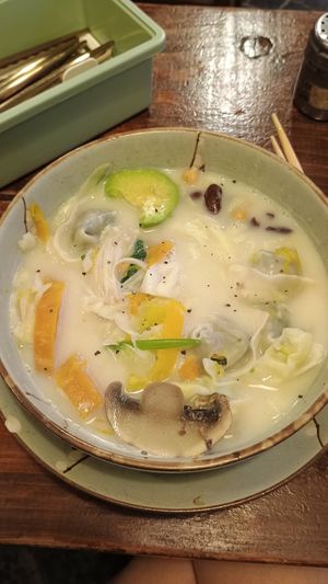 Soup $68 shown on door ( it's not on menu). Dumplings, tofu, mushrooms, pumpkin at Veggie Spinner 素食微調 in Hong Kong Island