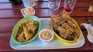 None fried chicken with vegan Mac and cheese, chipotle sauce and vegan coleslaw. at Evoden in Manchester