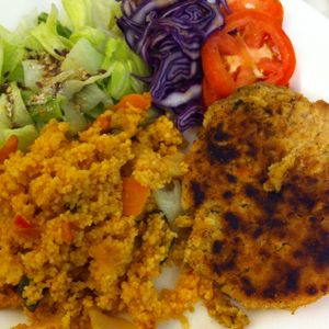 homemade chickpea burger with hot spicy cuscus and mixed salad  at Soul Food in Valletta