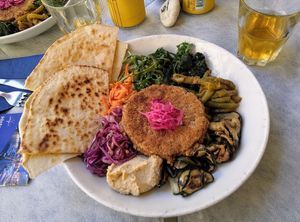 Vegan burger with sides at Soul Food in Valletta