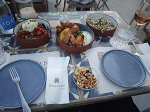 Naxos salad (with non-vegan feta) and chickpea salad at Avaton 1739 - Coffee & Wine Roof in Naxos