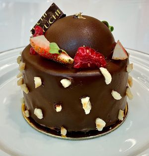 Dark midnight cake  at Yuchi Cafe Dubai in Dubai