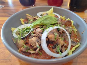 Chilaquiles verdes with fresh mushrooms and red salsa at Punto Verde Campeche in Campeche