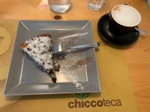 Vegan chocolate cream tart and oat milk cappuccino  at Chiccoteca in Pesaro