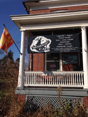 facade, establishment sign at Wanderlust Cafe in Bloomsburg