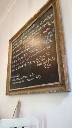 Inside specials board at No Milk Today in Berlin
