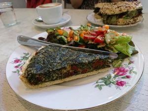 Spinach quiche with salad at No Milk Today in Berlin
