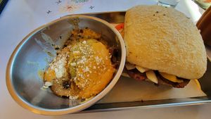 Sausage and onion panini and potatoes au gratin at The Kitchen at Farm Sanctuary in Watkins Glen