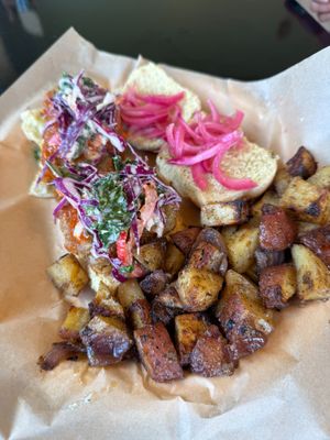 Crispy Buffalo Chik'n Sliders with cajun home fries at The Kitchen at Farm Sanctuary in Watkins Glen