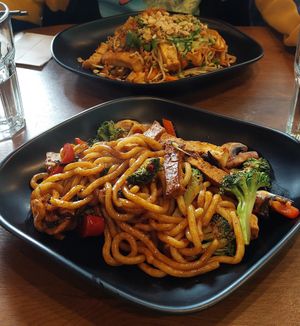 Fried udon noodles and spicy noodles at the back at Sen Chay in Helsinki