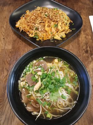 Veggie pho in the front and spicy noodles in the back at Sen Chay in Helsinki