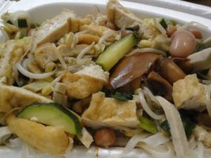 Fried noodles with tofu, vegan sausage, shiitake, sprouts and beans. at Sen Chay in Helsinki