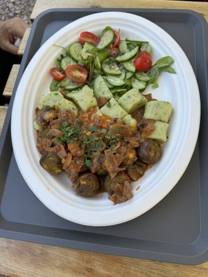 Veggie balls with spinach dumplings in mushroom sauce  at WegeMonia in Krakow