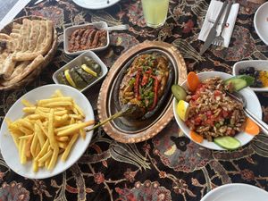 Grilled aubergine (vegan)stuffed grape leaves, hot spicy salad, chips and salad… delicious!!  at Old Ottoman Cafe & Restaurant in Istanbul