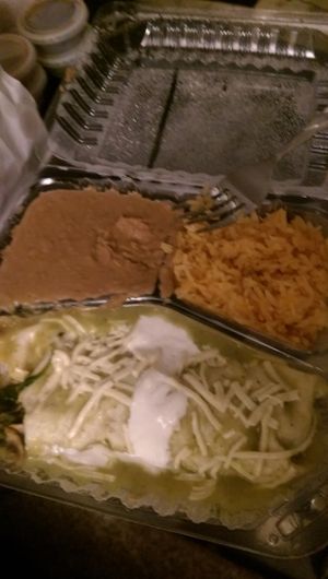 Vegan Enchilada Suiza
(flour tortilla filled with sauteed mushrooms, broccoli, zucchini, carrots, and spinach, topped with green sauce, vegan cheese and vegan sour cream served with beans and rice)
I took a bite and almost forgot to take a picture at Habanero's Bar and Grill in Scotts Valley