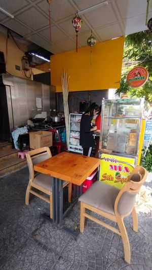 Not a fancy seating, but enough to sit comfortably compared with other street Banh Mi stalls. at Bánh Mì Chay Huynh Đệ  in Hoi An