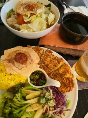 From left to right: Noodle soup, puerh tea, fried seitan cutlet, vinegar drink. at WhoTogether 胡同飲集聚場 in Taichung