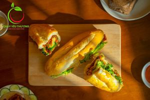 Banh mi Seitan Hy Lac (the Joyfully Grilled seitan): vegan pate, vegan mayo, green vietnamese herbs, pickles, grilled seitan, grilled mushroom, toasted nuts, homemade vegan sauce at Chay Yêu Thương in Nha Trang