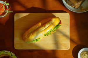 Banh mi Yêu Thương (to Cherish)
vegan pate, vegan mayo, green vietnamese herbs, pickles, lotus mocked meatloaf, mushroom mocked meatloaf, mushroom floss, homemade sauce at Chay Yêu Thương in Nha Trang