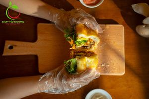 Bánh mì Nấm Nướng (grilled oyster mushroom): vegan pate, vegan mayo, green herbs, pickles, grilled oyster mushroom, mushroom flossed, homemade sauce at Chay Yêu Thương in Nha Trang