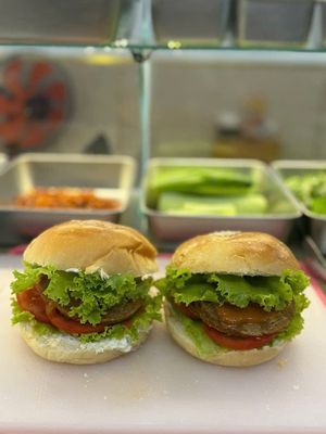 Vegan Hamburger: lettuces, tomato, vegan seitan patties, homemade sauce and vegan mayo at Chay Yêu Thương in Nha Trang