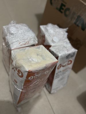 Broken and super smelly milk cartons due to the worst packaging 🤮🤢  at Abasto Vegano in Mexico City