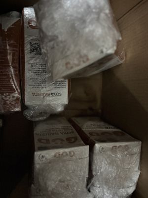 Broken and super smelly milk cartons due to the worst packaging 🤮🤢 and soaked containing box 📦   at Abasto Vegano in Mexico City