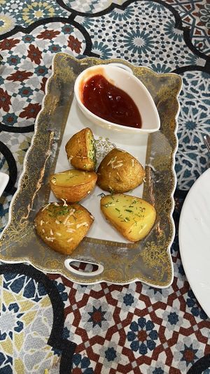 potatoes with ketchup   at Afrosiyob in Samarkand