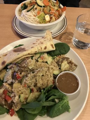 Thai stir fry over rice noodles and quinoa spinach salad with chipata bread. at Annapurna's World Vegetarian Cafe in Santa Fe