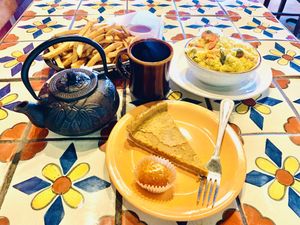 kitchari, masala fries, ladu, cheesecake, tea at Annapurna's World Vegetarian Cafe in Santa Fe